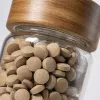 Transparent glass canned multivitamin tablet nutritional supplement, one tablet per day for adults Application Scenario
